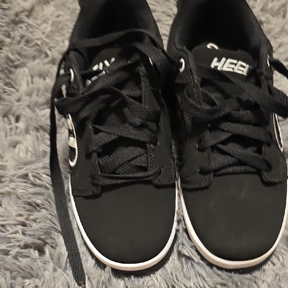 Black Sneakers with White Accents